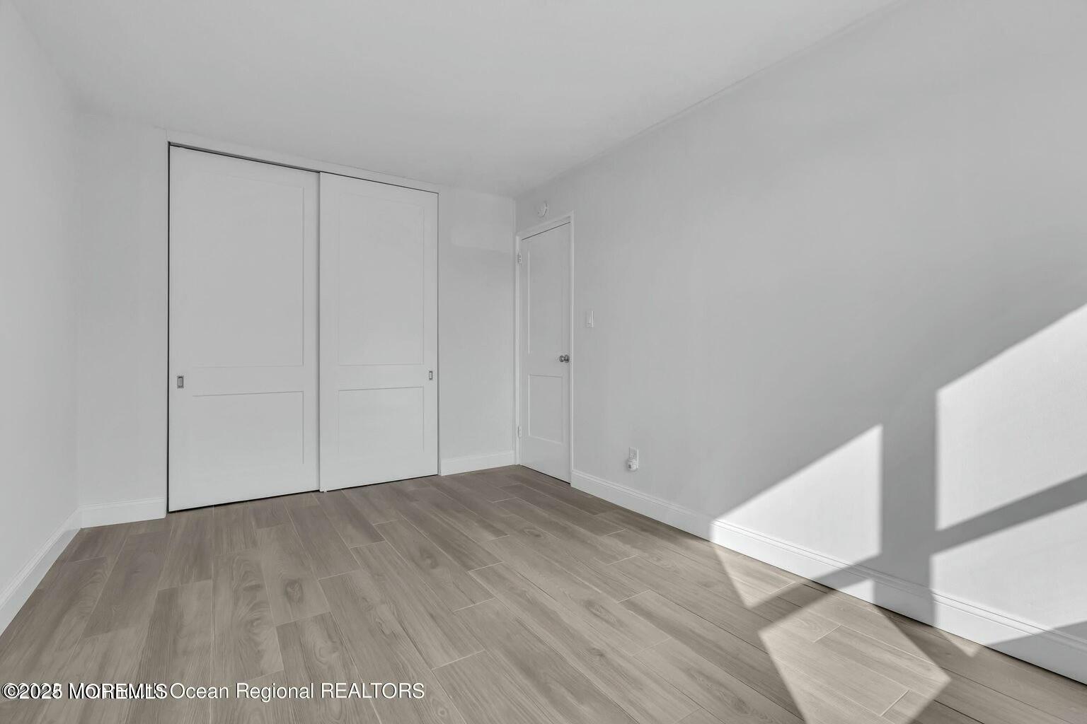 28 Riverside Avenue, Unit 1G Red Bank, NJ 07701 - Photo 15 of 25 a view of an empty room