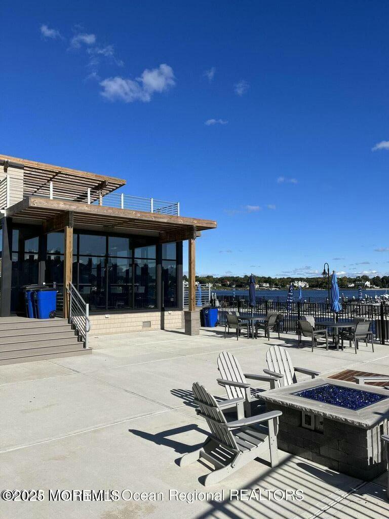 28 Riverside Avenue, Unit 1G Red Bank, NJ 07701 - Photo 18 of 25 a view of a building with sitting area