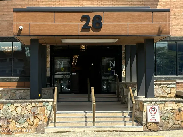 a front view of a building with street