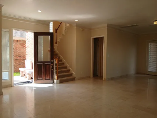 a view of an entryway with staircase