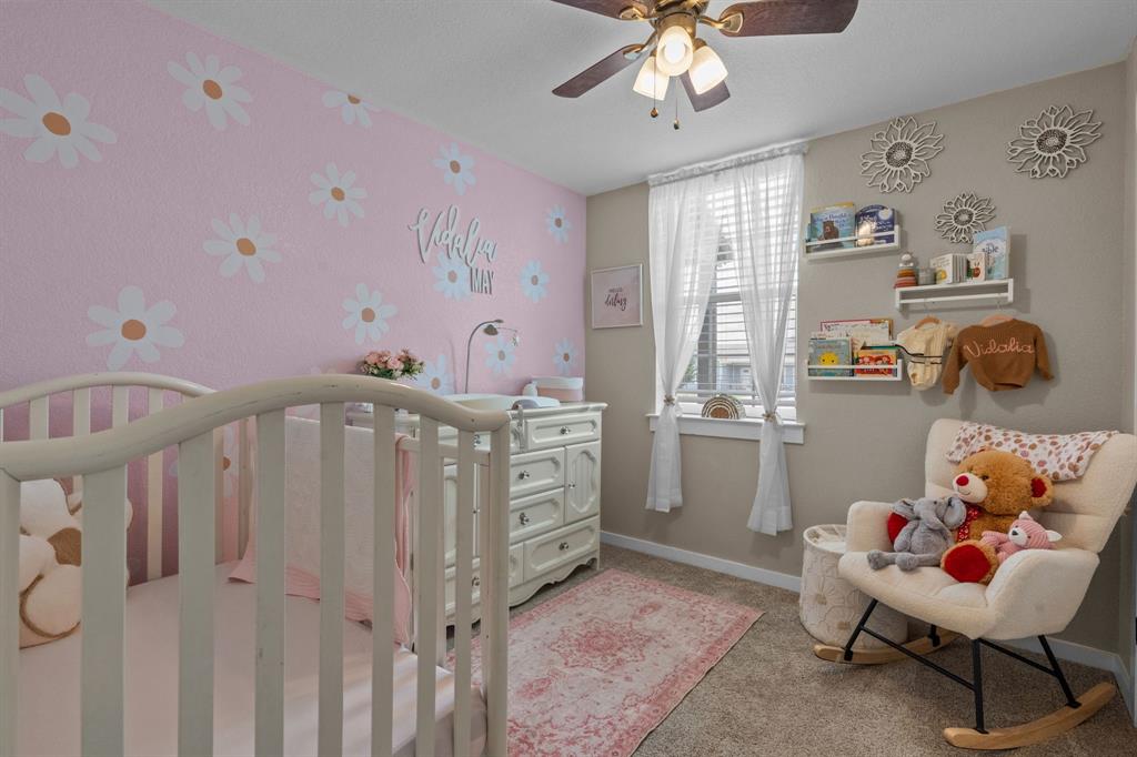 395 Private Road 4219 Decatur, TX 76234 - Photo 24 of 29 a bedroom with furniture and a window