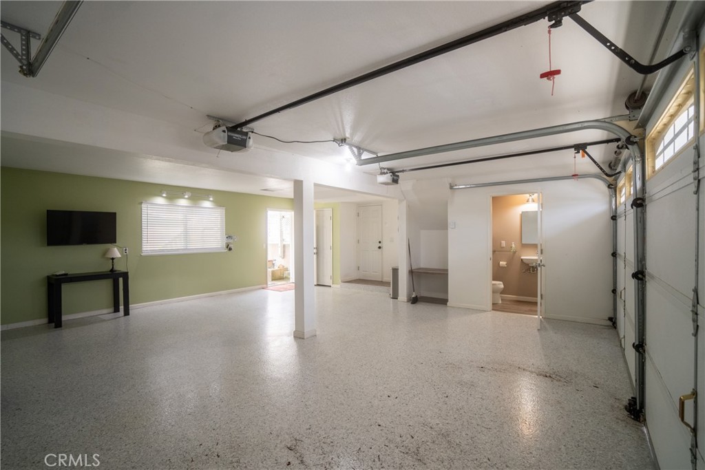 4125 Tranquilla Avenue Atascadero, CA 93422 - Photo 23 of 27 a view of empty room with wooden floor and fan