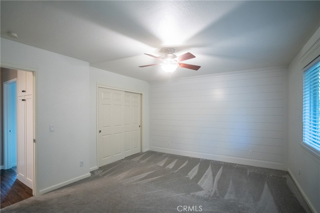 4125 Tranquilla Avenue Atascadero, CA 93422 - Photo 10 of 27 an empty room with windows and fan