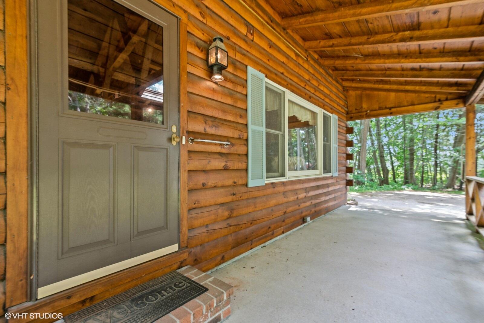 650 Ferry Road Saco, ME 04072 - Photo 4 of 38 Covered porch leads to open living area