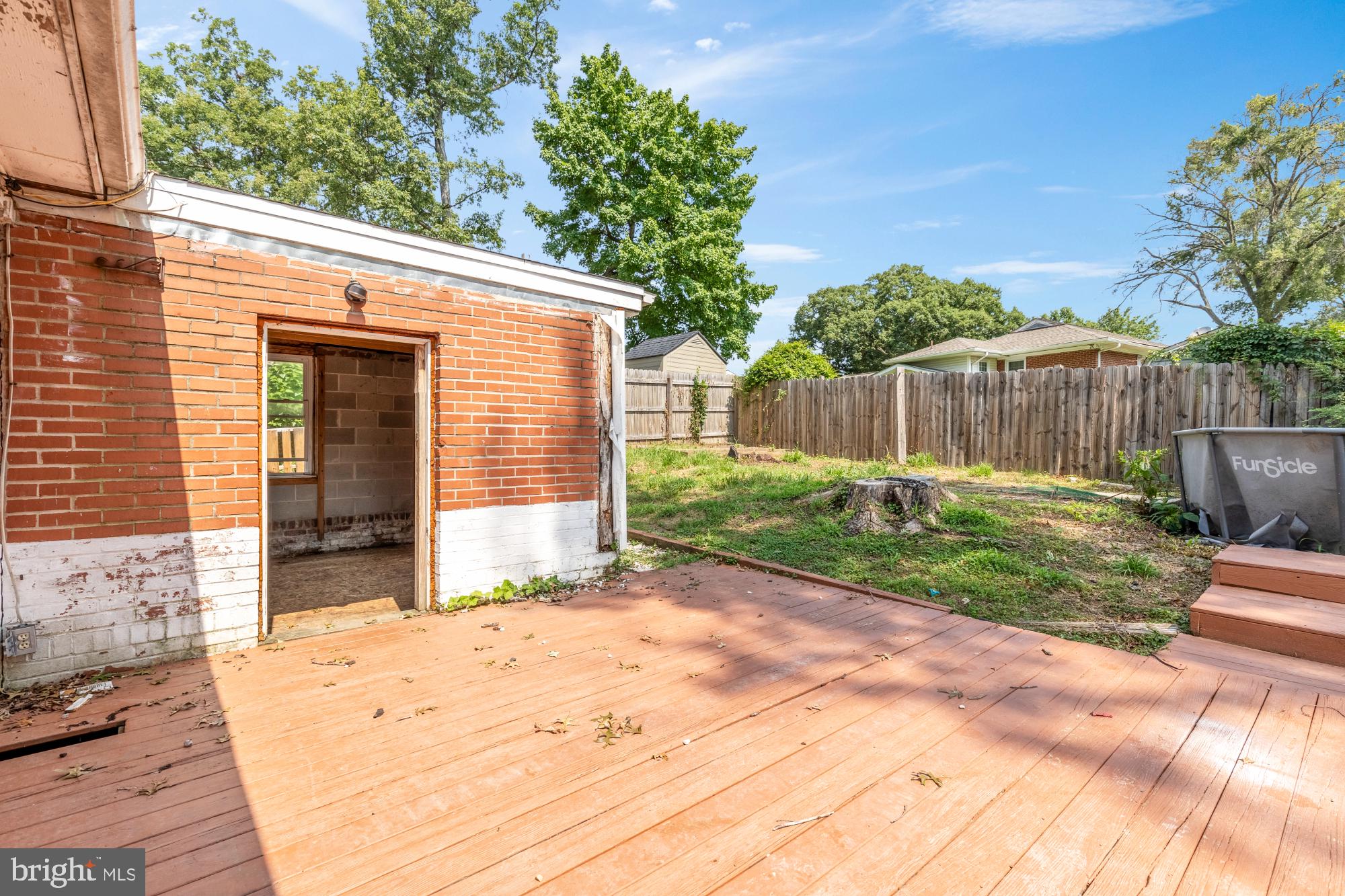 7302 Riverdale Road Lanham, MD 20706 - Photo 31 of 33 a view of a backyard with plants and large trees