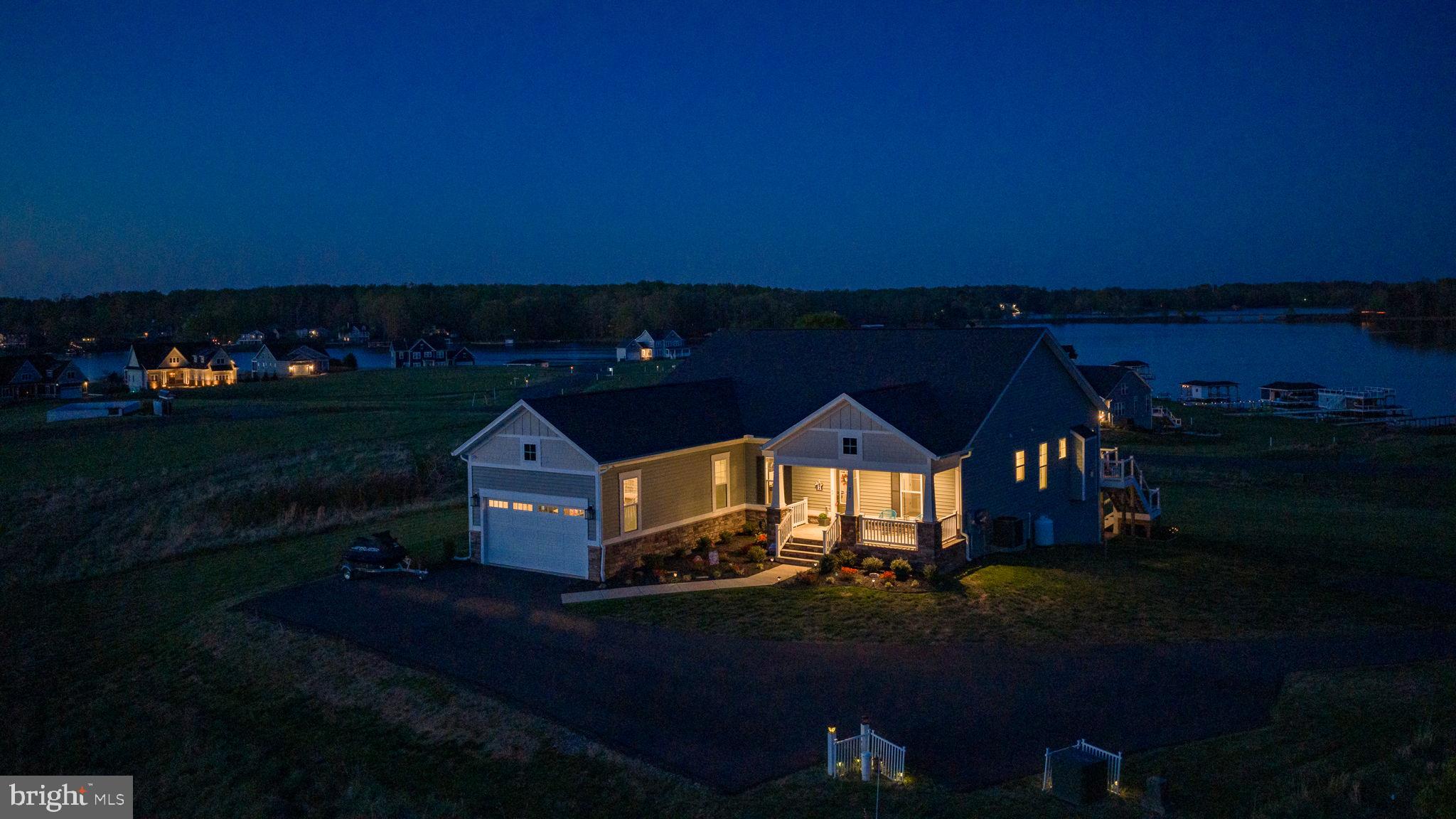 257 Rock Island Ridge Mineral, VA 23117 - Photo 114 of 128 a front view of a house with a yard