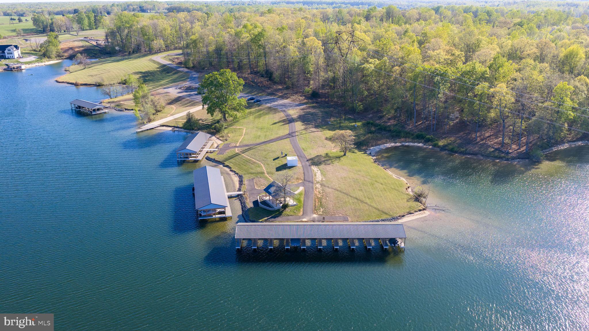 257 Rock Island Ridge Mineral, VA 23117 - Photo 126 of 128 an aerial view of a house with swimming pool and outdoor seating