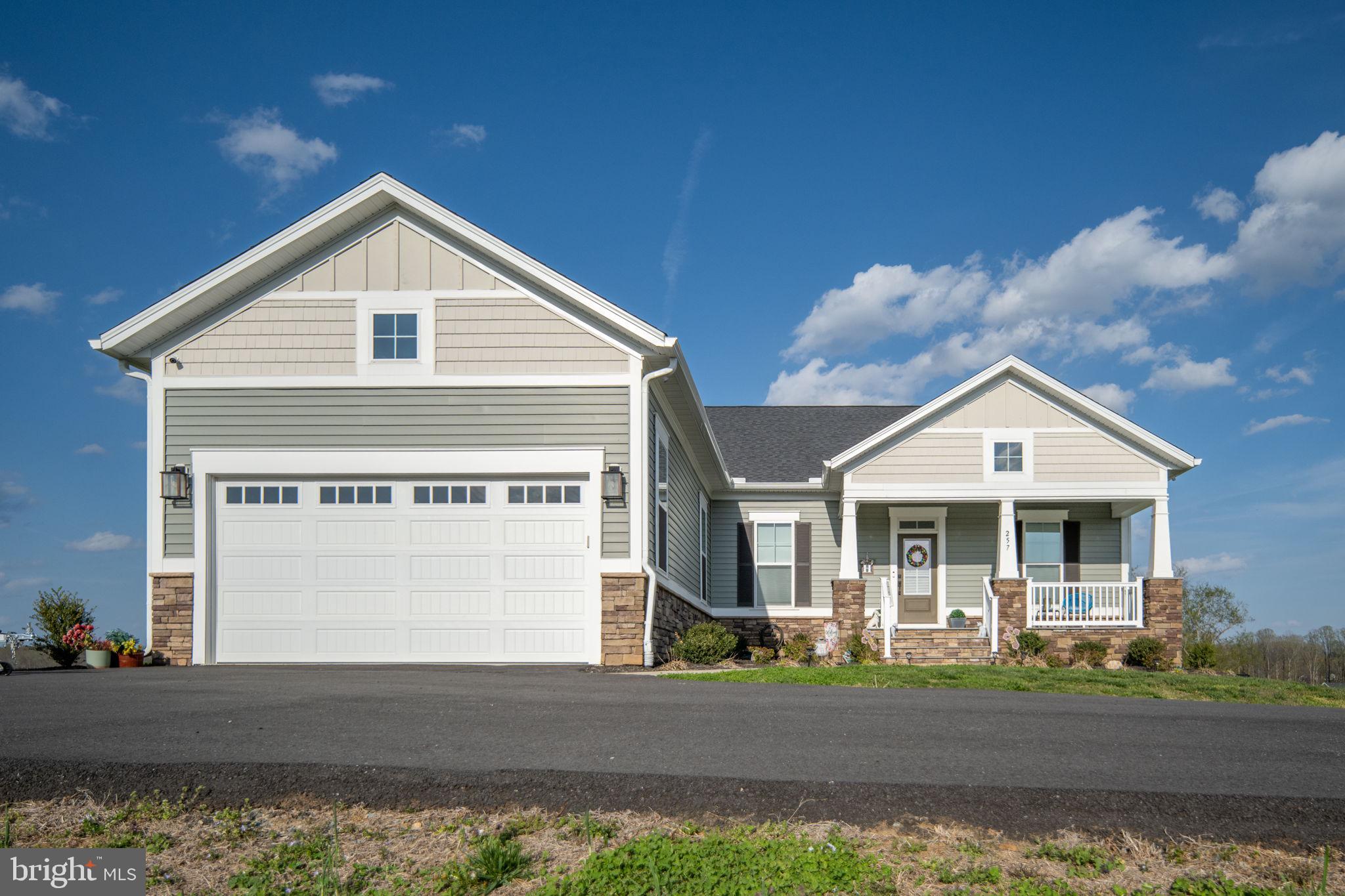 257 Rock Island Ridge Mineral, VA 23117 - Photo 16 of 128 a front view of a house with a yard