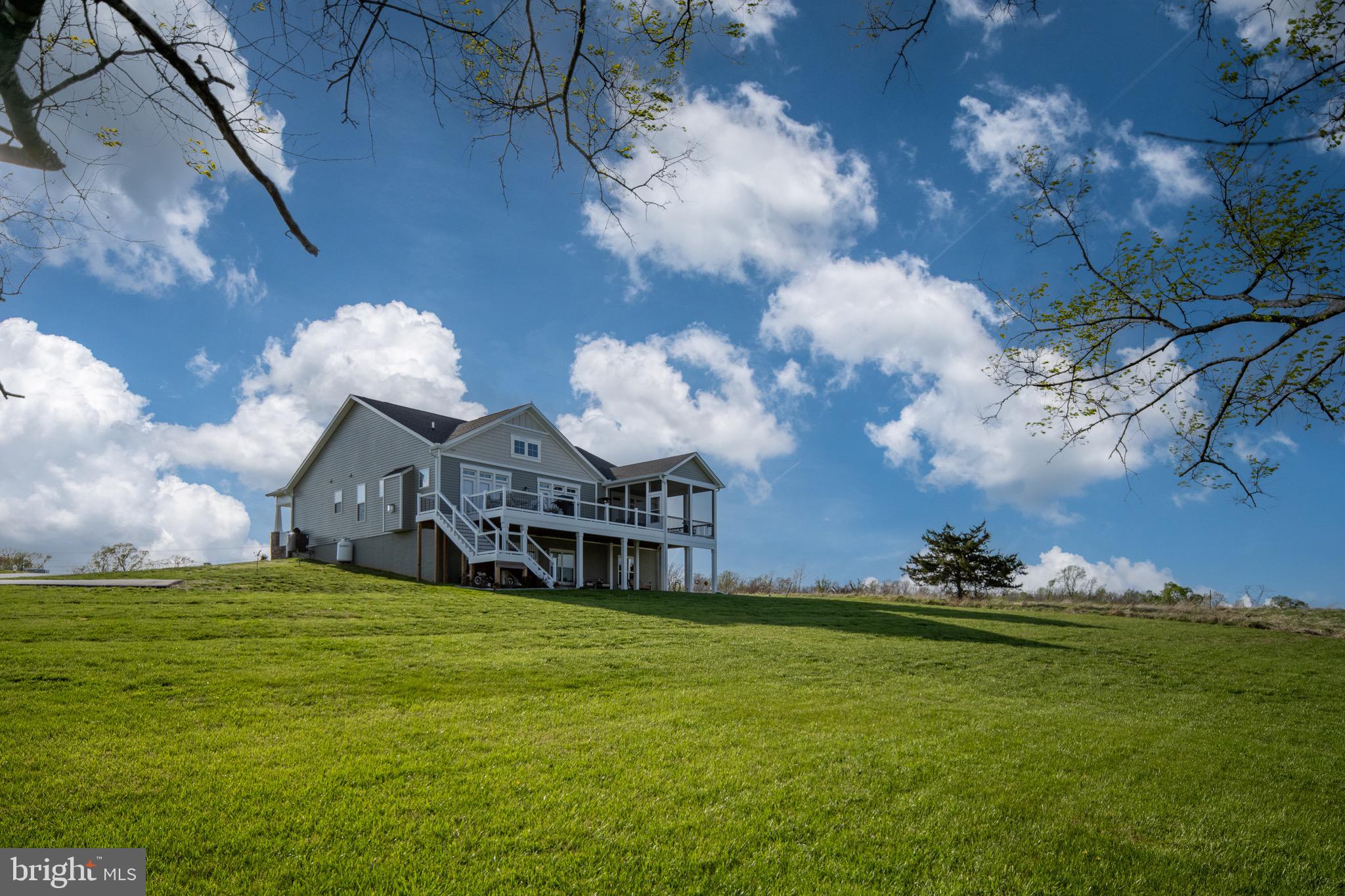 257 Rock Island Ridge Mineral, VA 23117 - Photo 27 of 128 a view of a house with a big yard