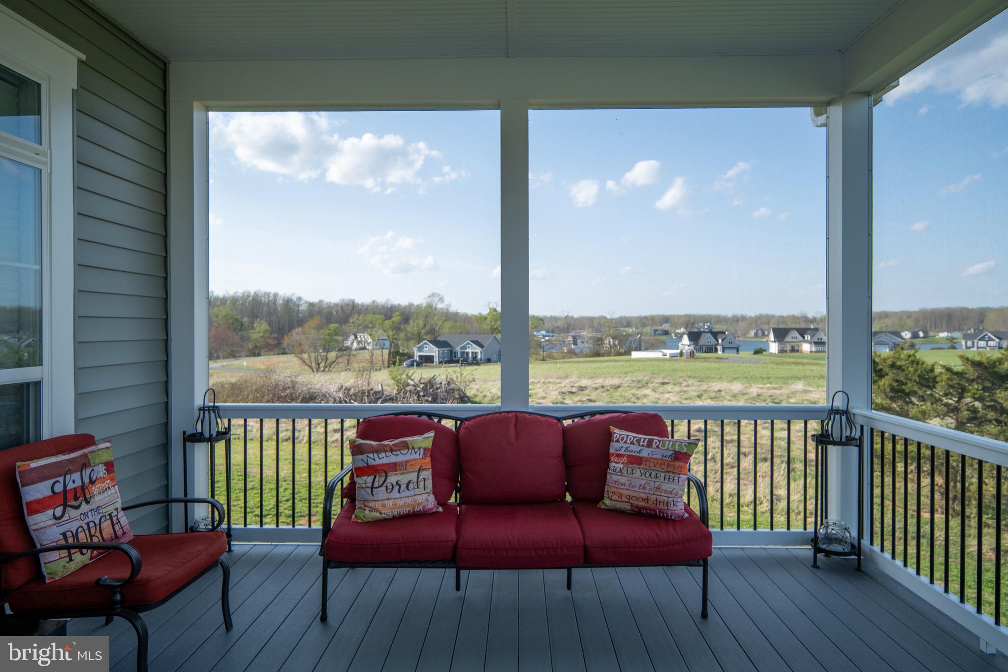 257 Rock Island Ridge Mineral, VA 23117 - Photo 35 of 128 a balcony with furniture and wooden floor
