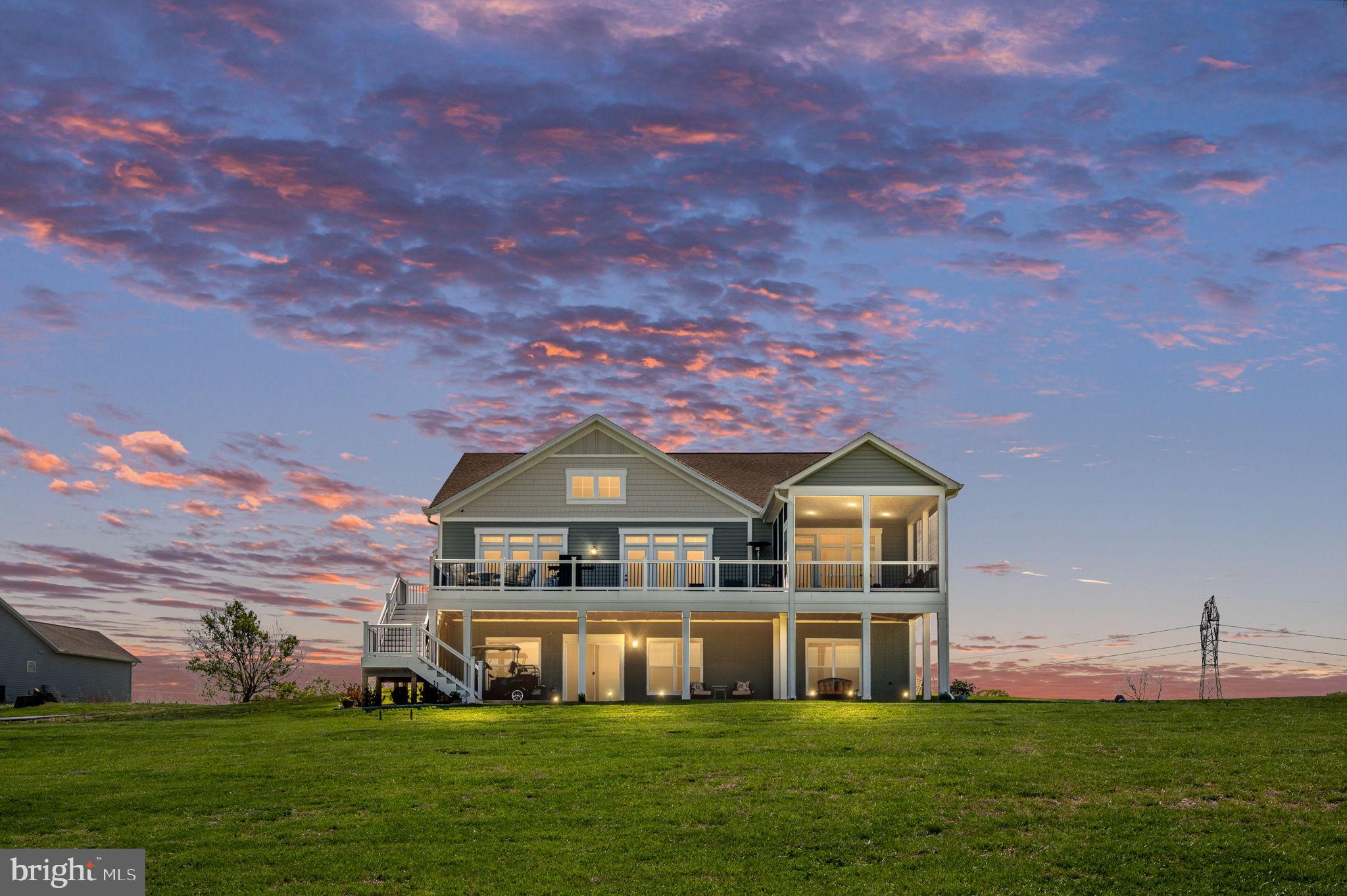 257 Rock Island Ridge Mineral, VA 23117 - Photo 4 of 128 a front view of a house with a garden