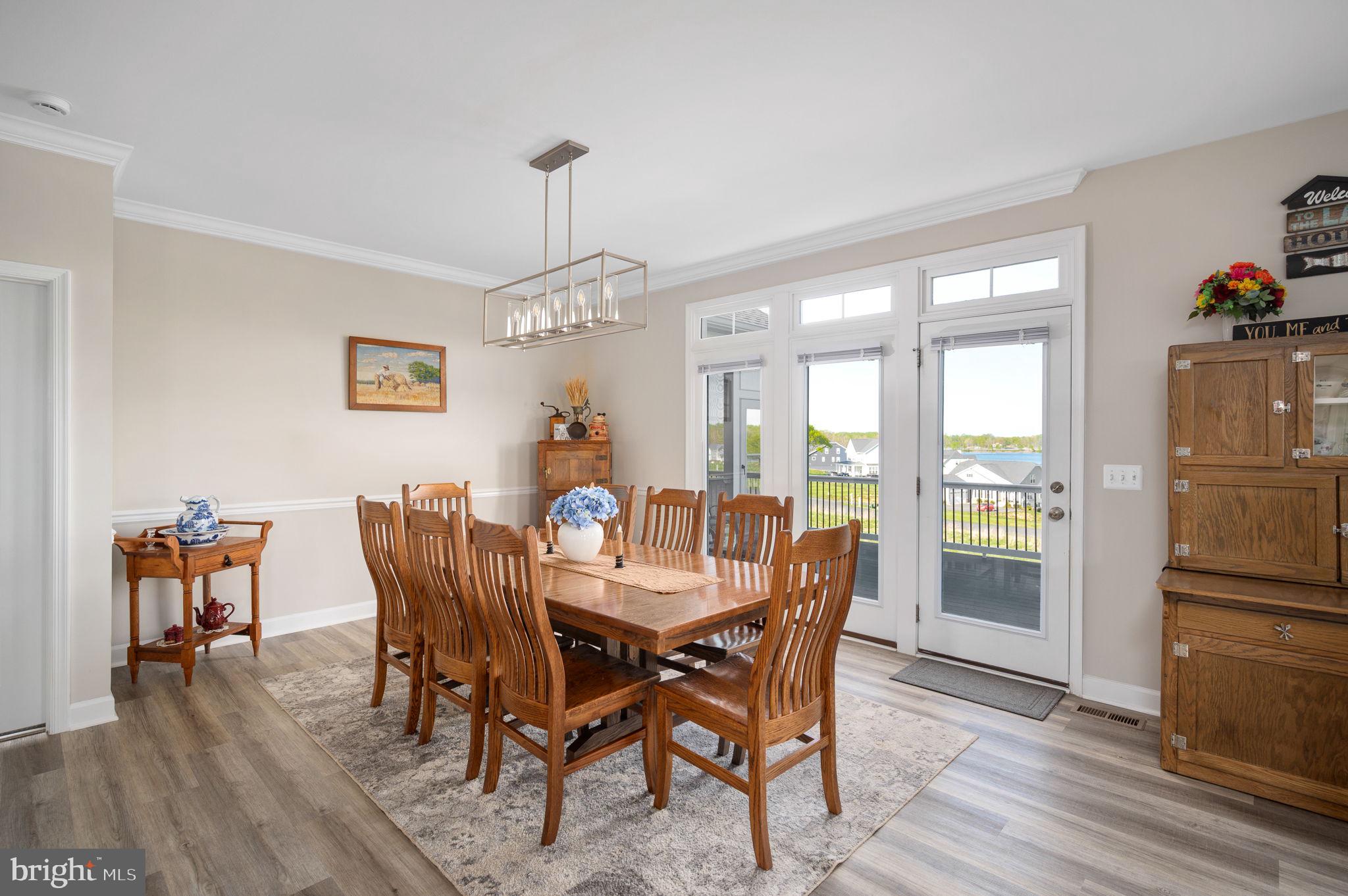 257 Rock Island Ridge Mineral, VA 23117 - Photo 50 of 128 a view of a dining room with furniture window and wooden floor