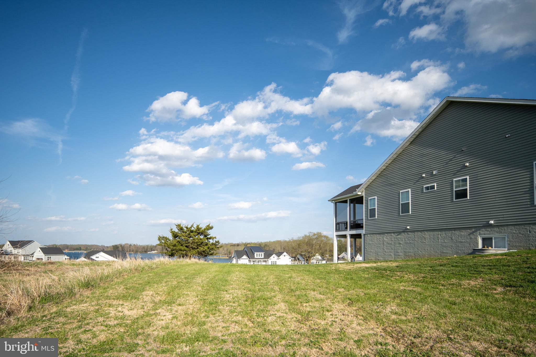 257 Rock Island Ridge Mineral, VA 23117 - Photo 51 of 128 a view of a house with a yard