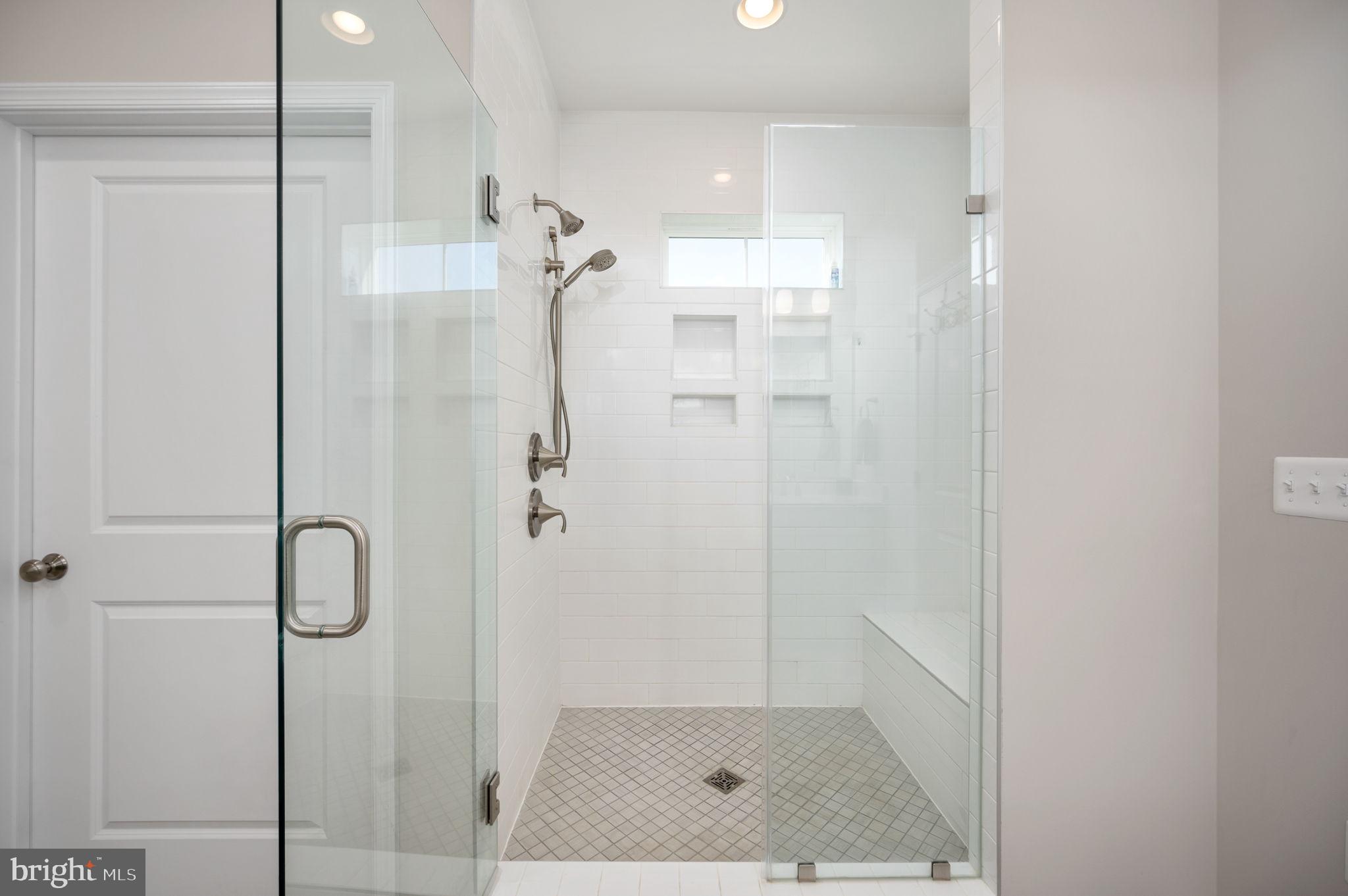 257 Rock Island Ridge Mineral, VA 23117 - Photo 68 of 128 a bathroom with a glass shower door