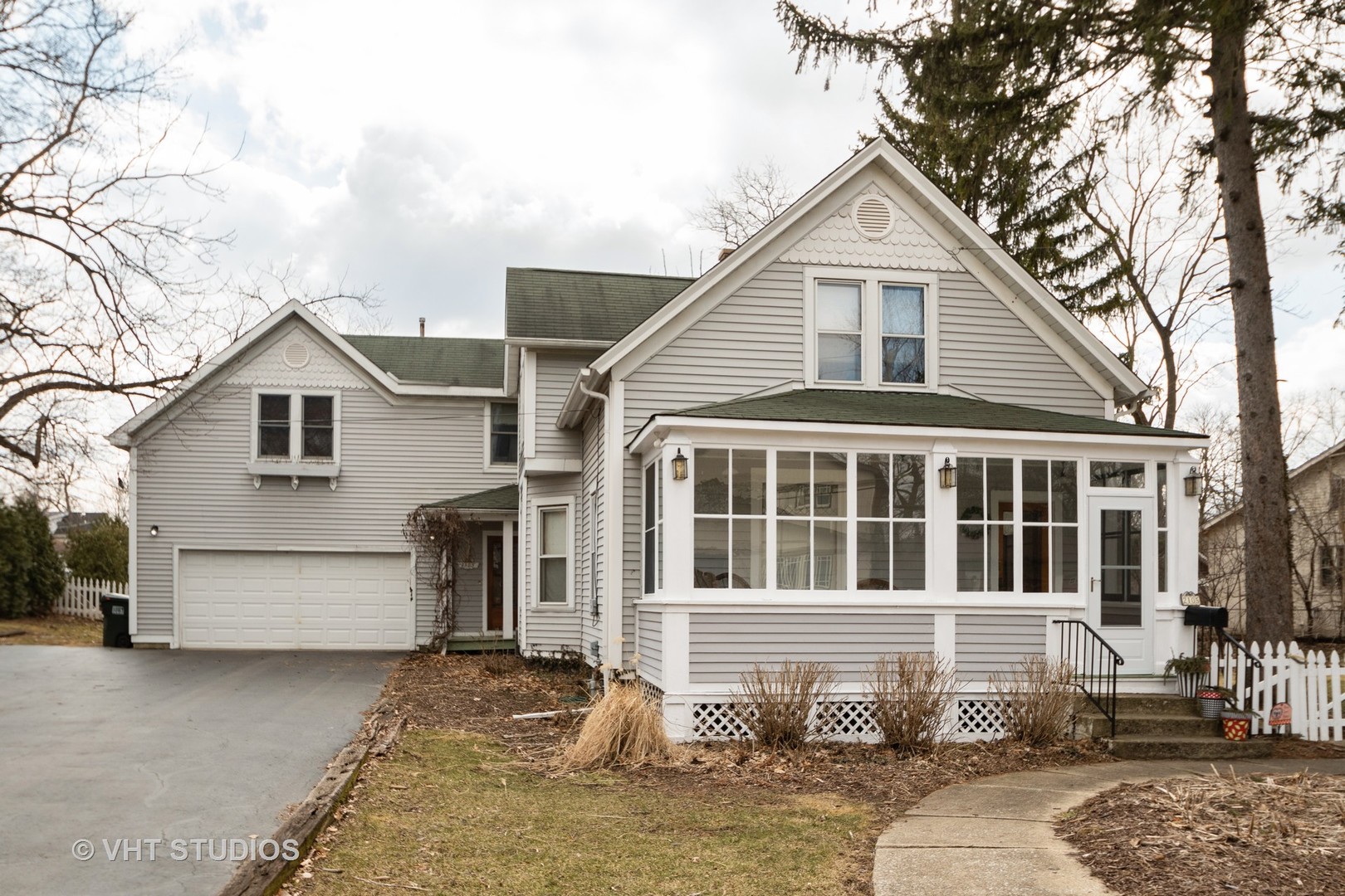 2105 Cedar Road Homewood, IL 60430 - Photo 1 of 23 a front view of a house with a large tree