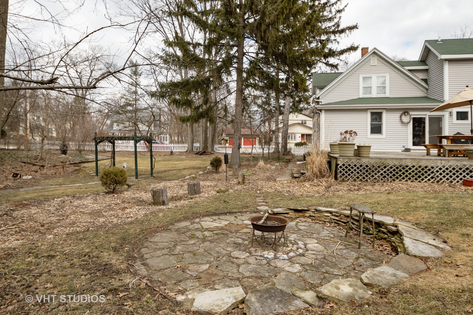 2105 Cedar Road Homewood, IL 60430 - Photo 15 of 23 a front view of a house with a yard covered with snow in the background