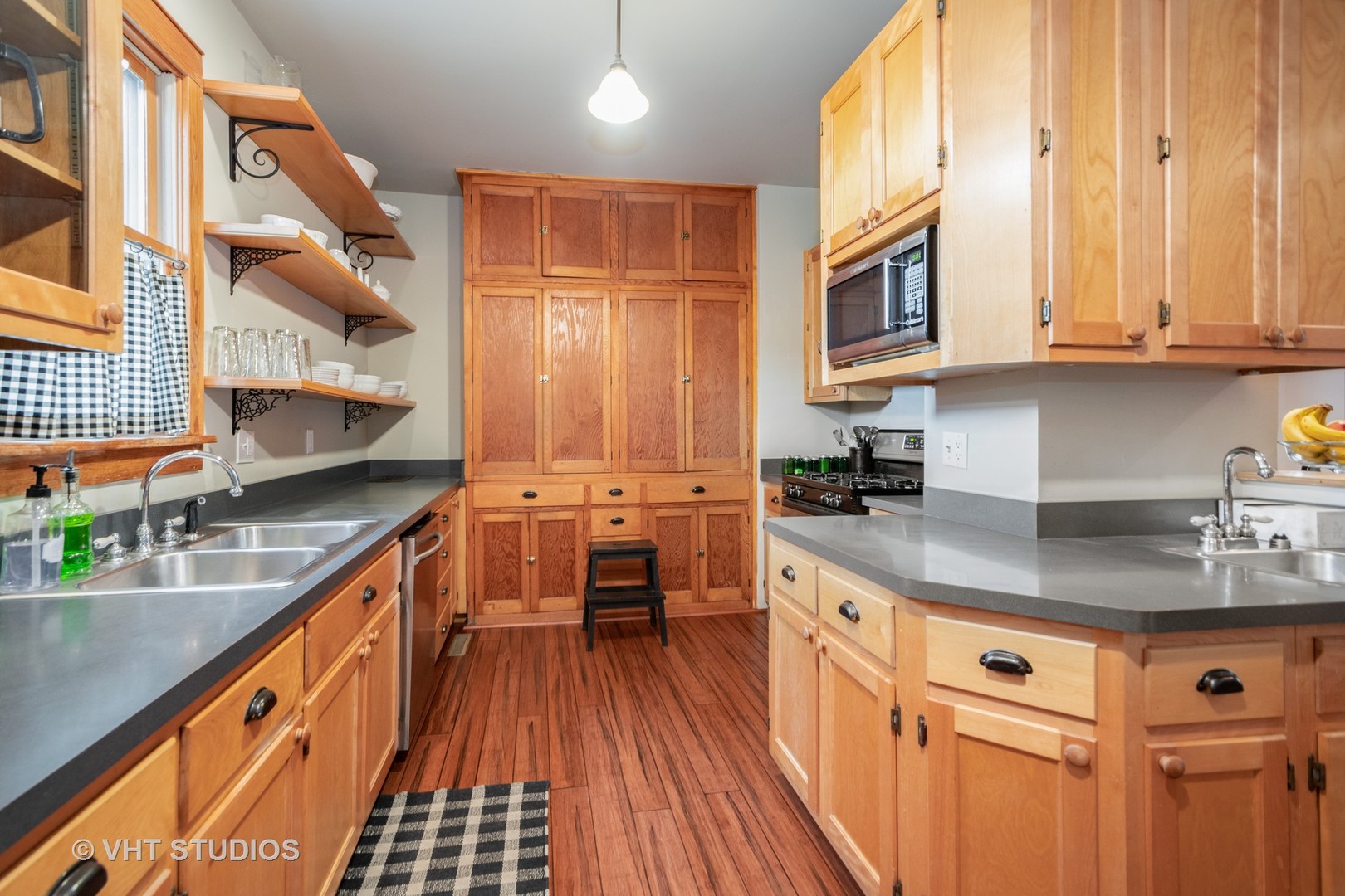 2105 Cedar Road Homewood, IL 60430 - Photo 5 of 23 a kitchen with stainless steel appliances granite countertop a stove a sink and a refrigerator
