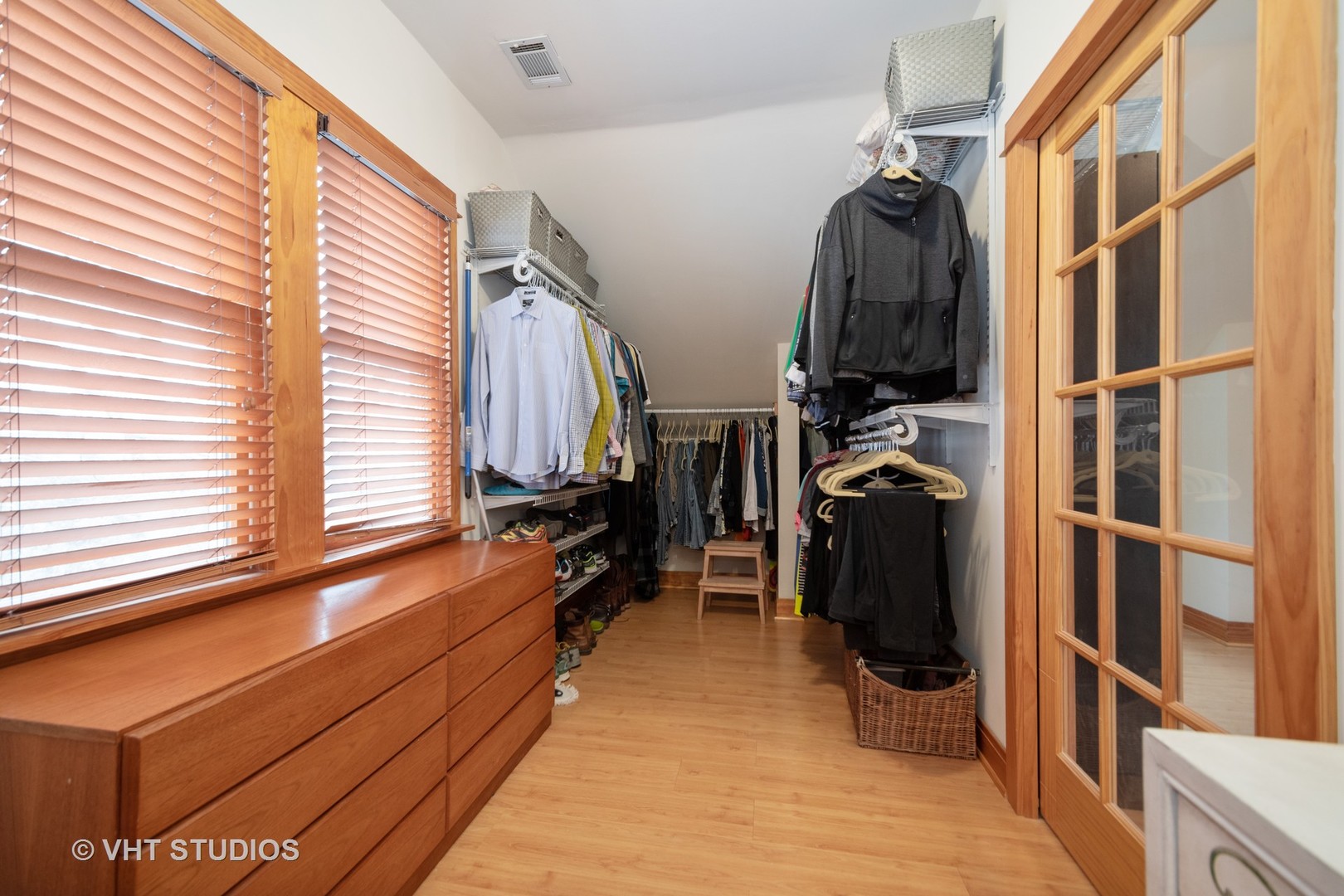 2105 Cedar Road Homewood, IL 60430 - Photo 9 of 23 a view of walk in closet with clothes and shoes
