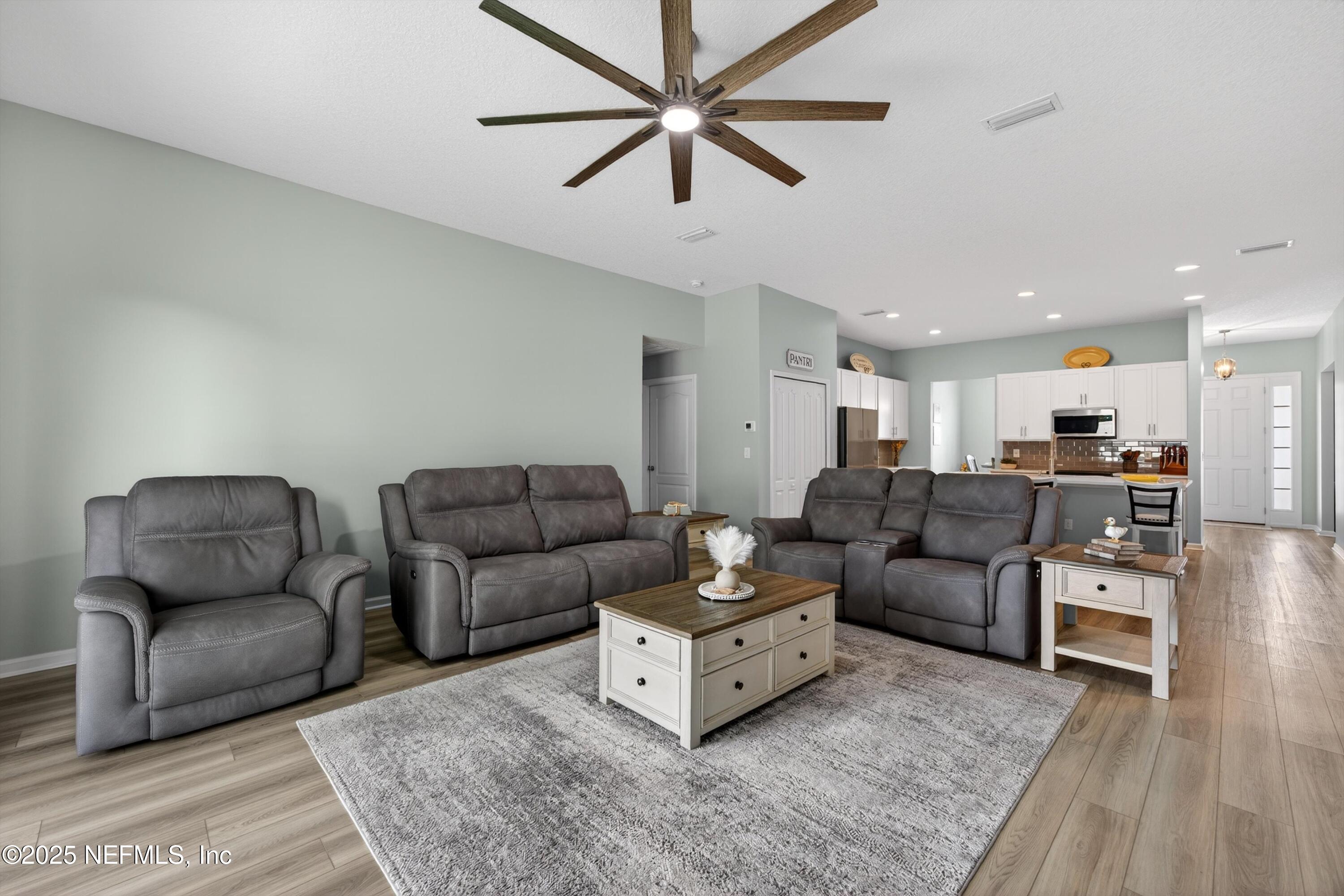 1733 Austin Lk Way Middleburg, FL 32068 - Photo 14 of 37 13-Family Room A6
