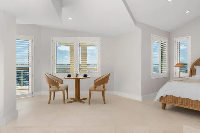 a view of a balcony with chairs