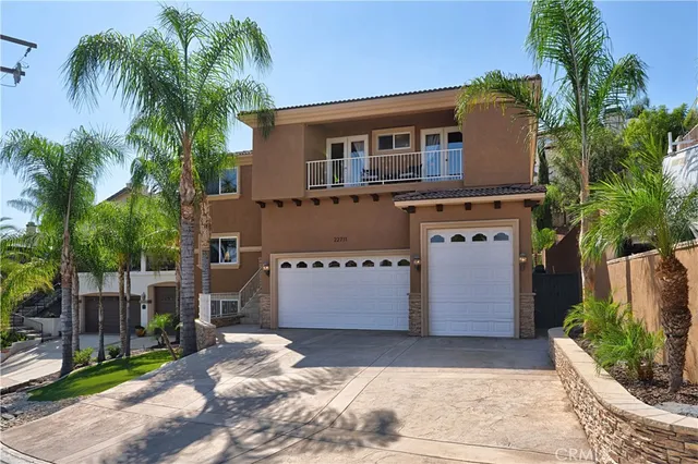 a view of stairs and yard with wooden fence