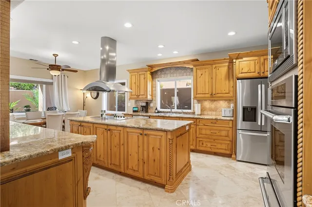 a bathroom with a tub a window and a shower