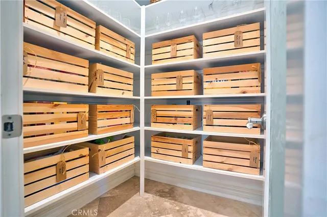 an aerial view of residential houses with outdoor space and swimming pool