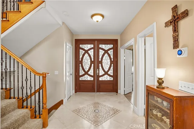 a view of an entryway with staircase