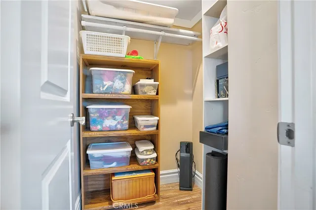 a kitchen with a stove and a fireplace