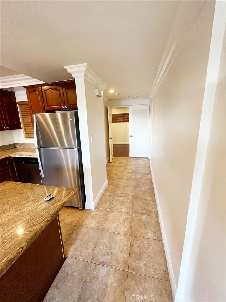 100 Cliff Drive, Unit 8 Laguna Beach, CA 92651 - Photo 11 of 46 a view of a kitchen from the hallway