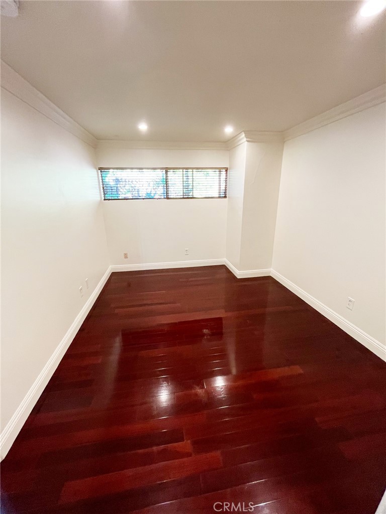 100 Cliff Drive, Unit 8 Laguna Beach, CA 92651 - Photo 17 of 46 a view of room with an empty space and a window