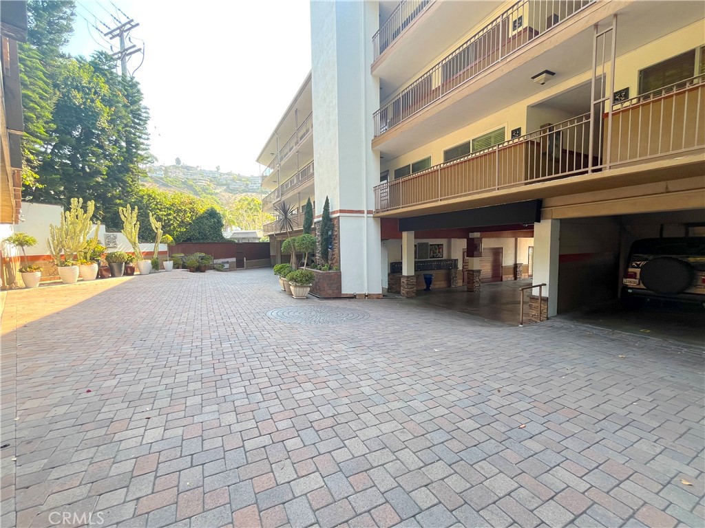100 Cliff Drive, Unit 8 Laguna Beach, CA 92651 - Photo 34 of 46 a view of a street with a building