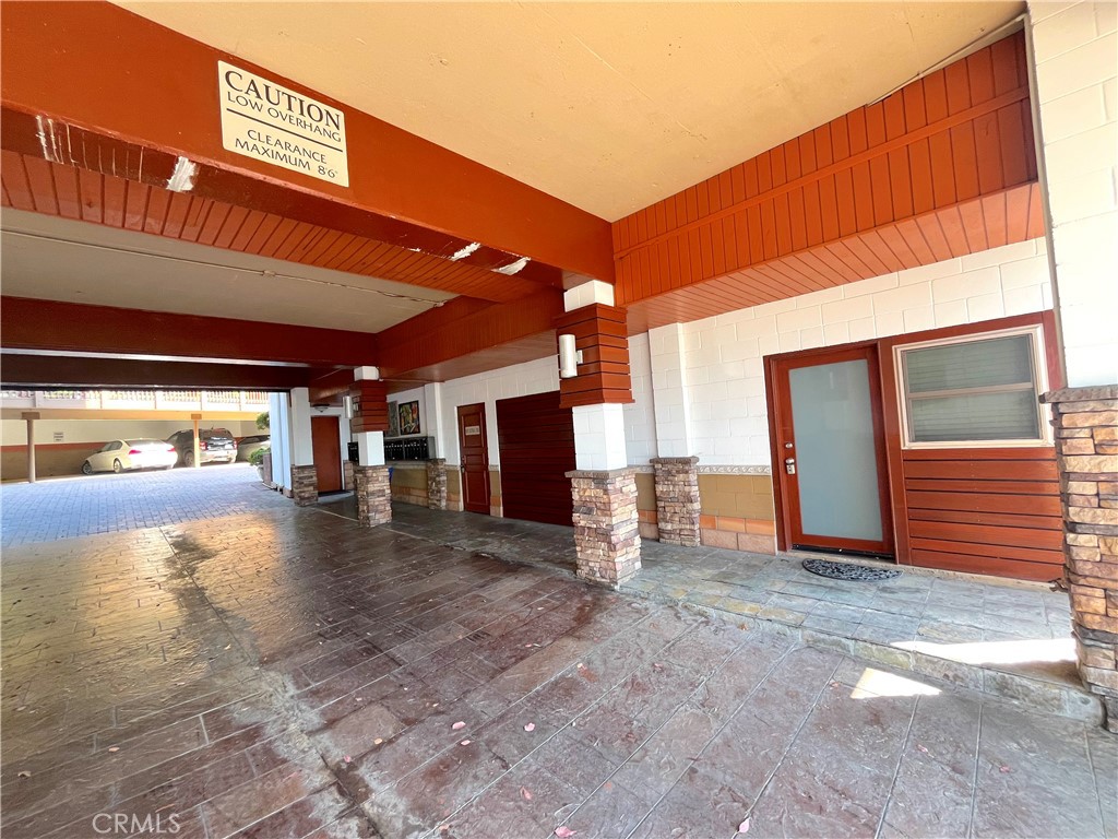 100 Cliff Drive, Unit 8 Laguna Beach, CA 92651 - Photo 37 of 46 a view of a building with a patio