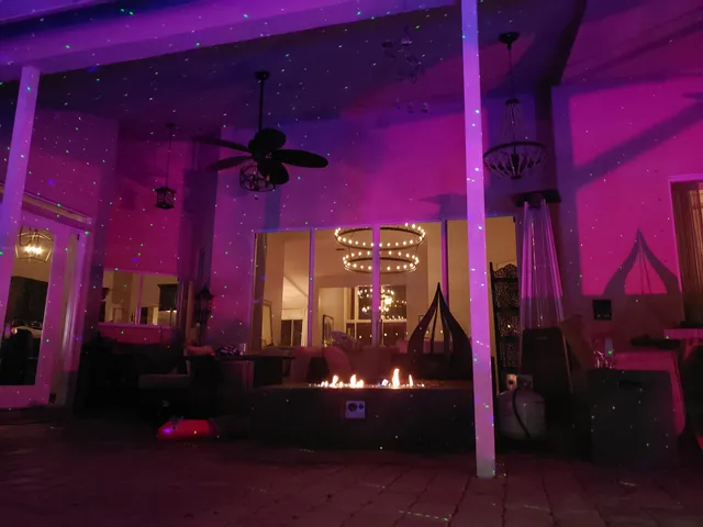 a view of a golf course with a tree