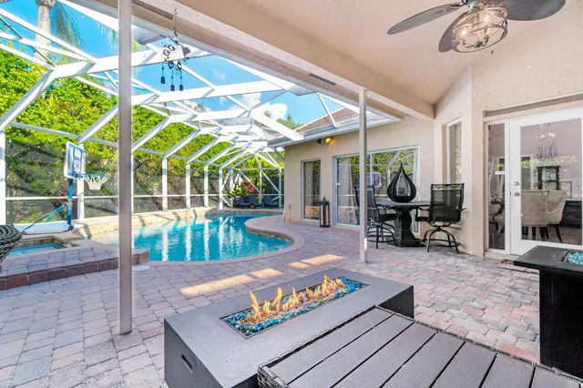 a living room with furniture a couch and wooden floor