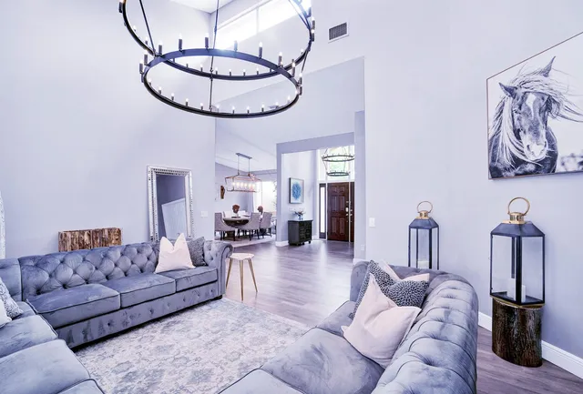 a view of an entryway and wooden floor