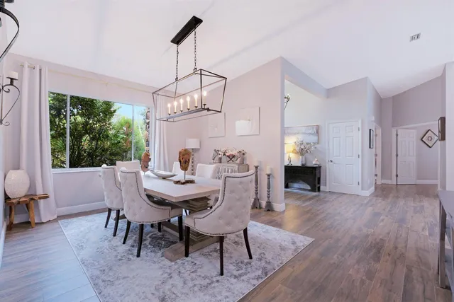 a bedroom with a bed and cabinets
