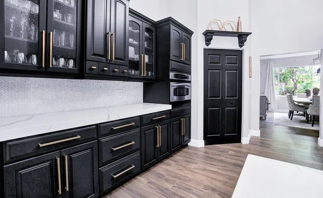 a room that has a bed and a chair in it