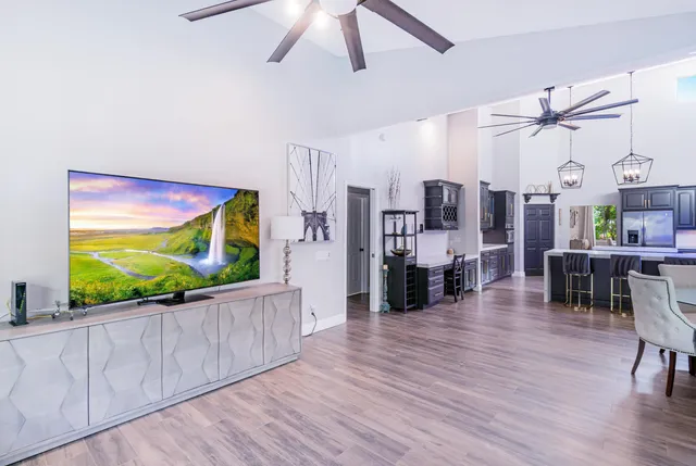 a view of a house with a yard and a garden