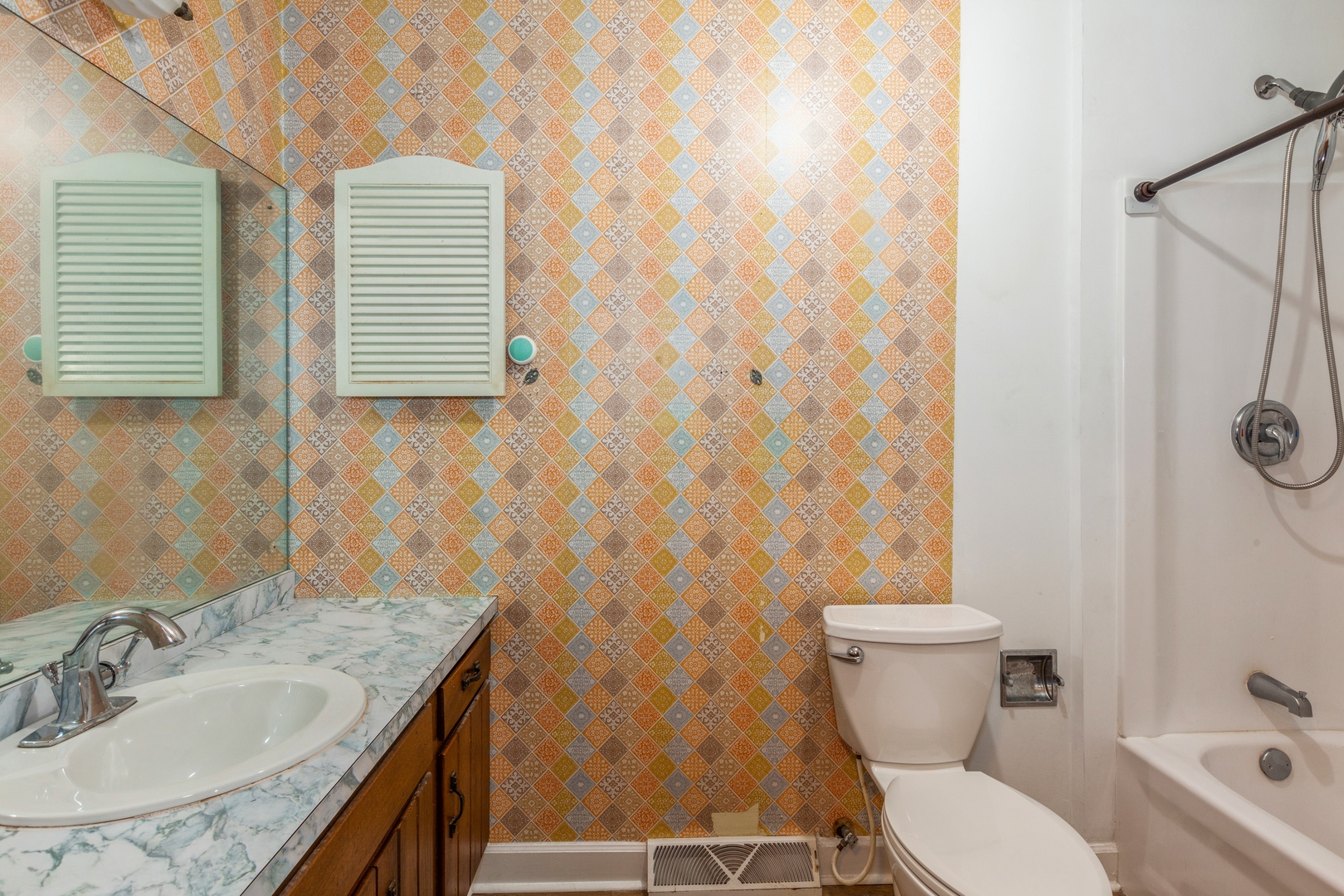 1205 Comet Drive Aurora, IL 60505 - Photo 10 of 15 a bathroom with a granite countertop toilet sink and mirror
