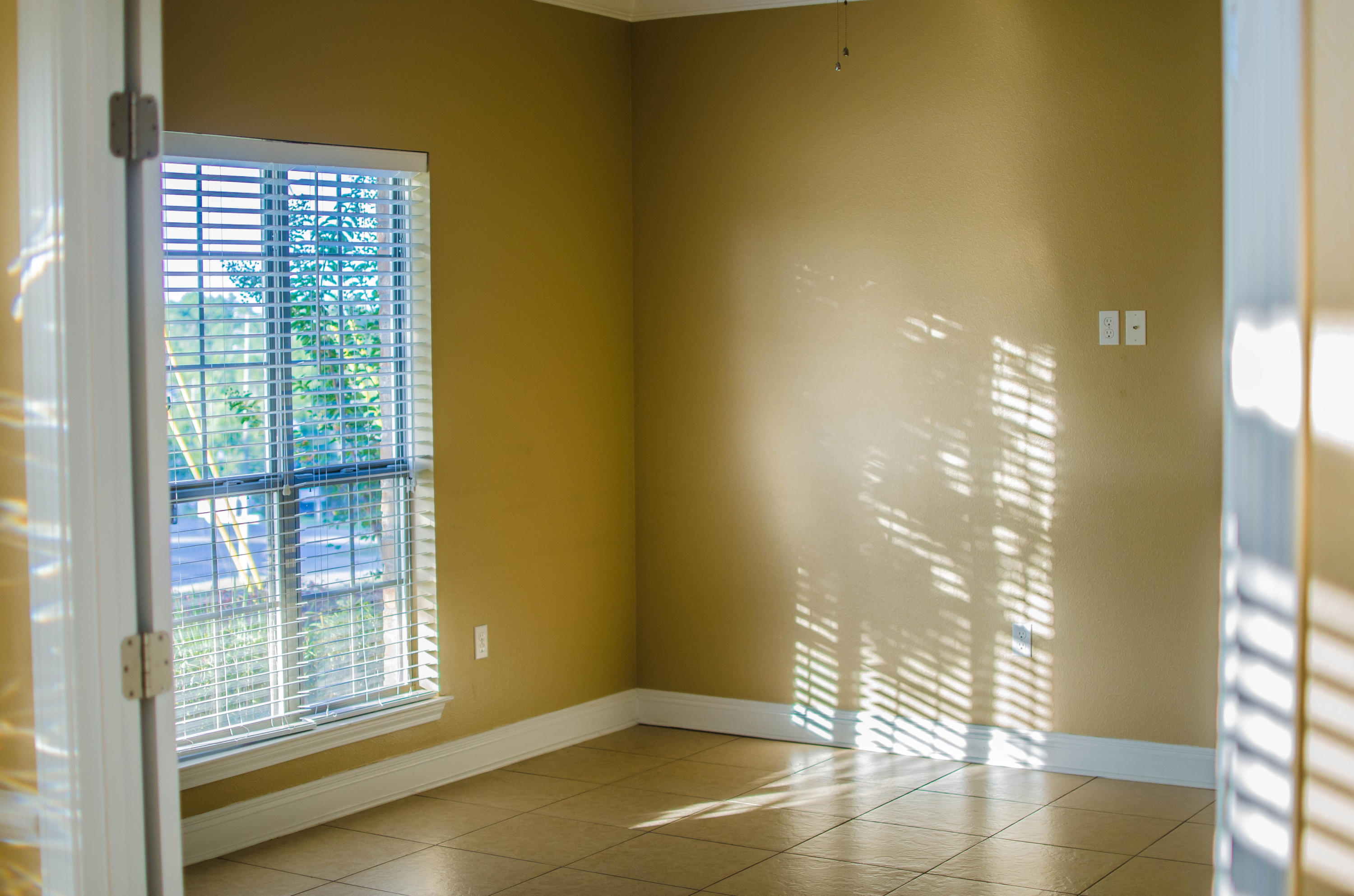 630 Red Fern Road Crestview, FL 32536 - Photo 14 of 38 a view of an empty room with a window