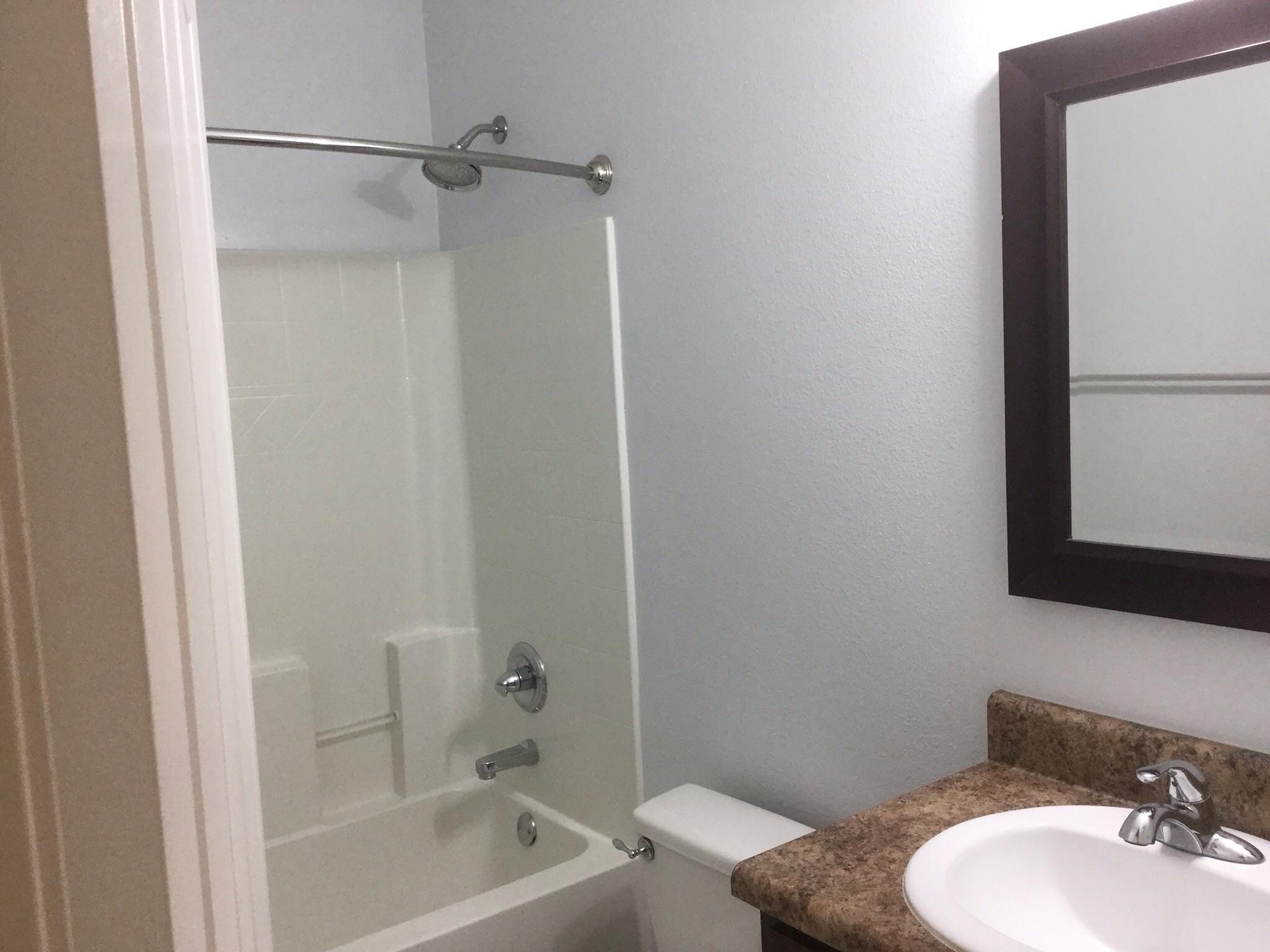 630 Red Fern Road Crestview, FL 32536 - Photo 29 of 38 a bathroom with a sink and a mirror
