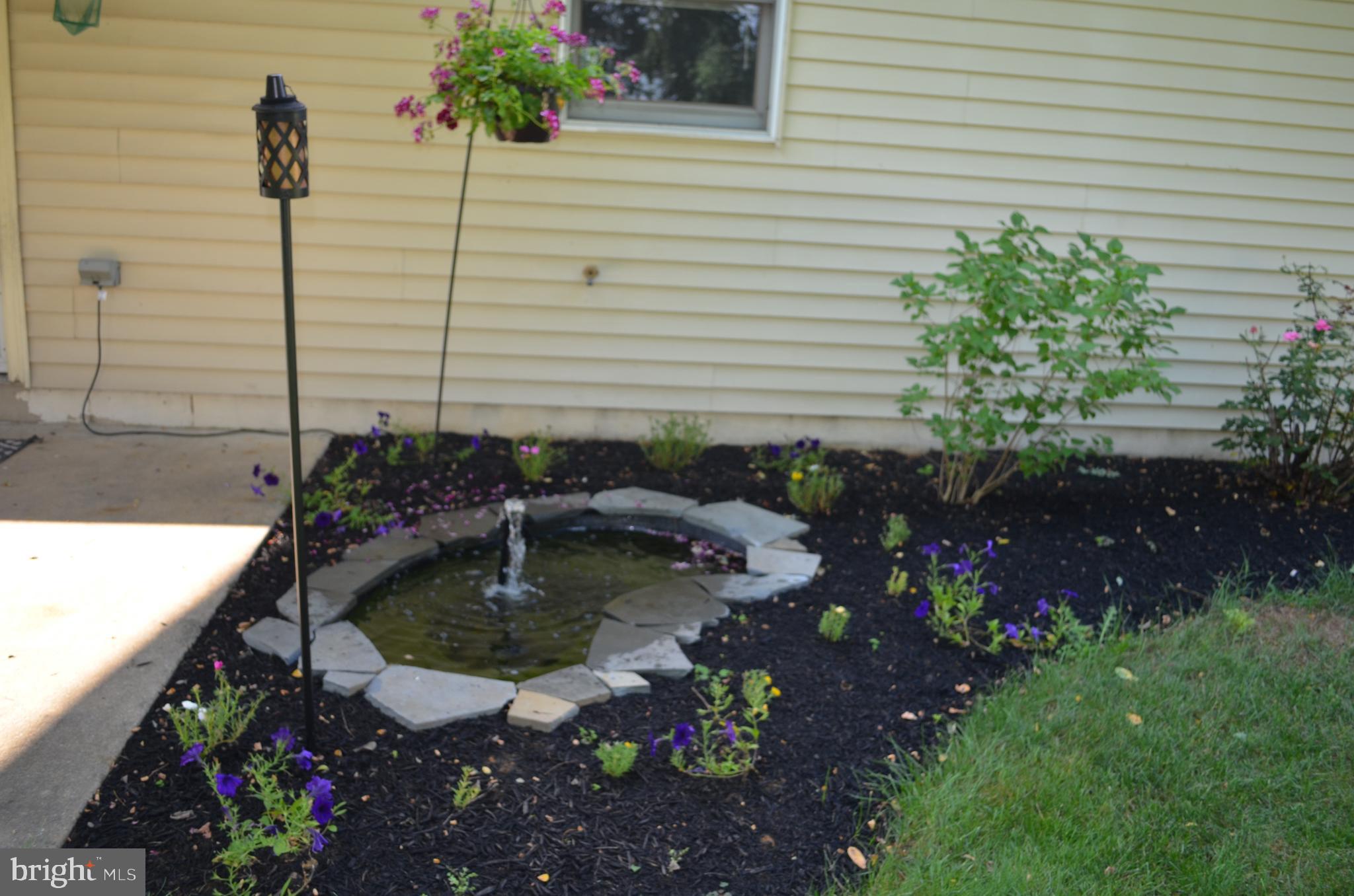 78 Allen Road Ephrata, PA 17522 - Photo 15 of 17 Relax by the water feature in the back yard