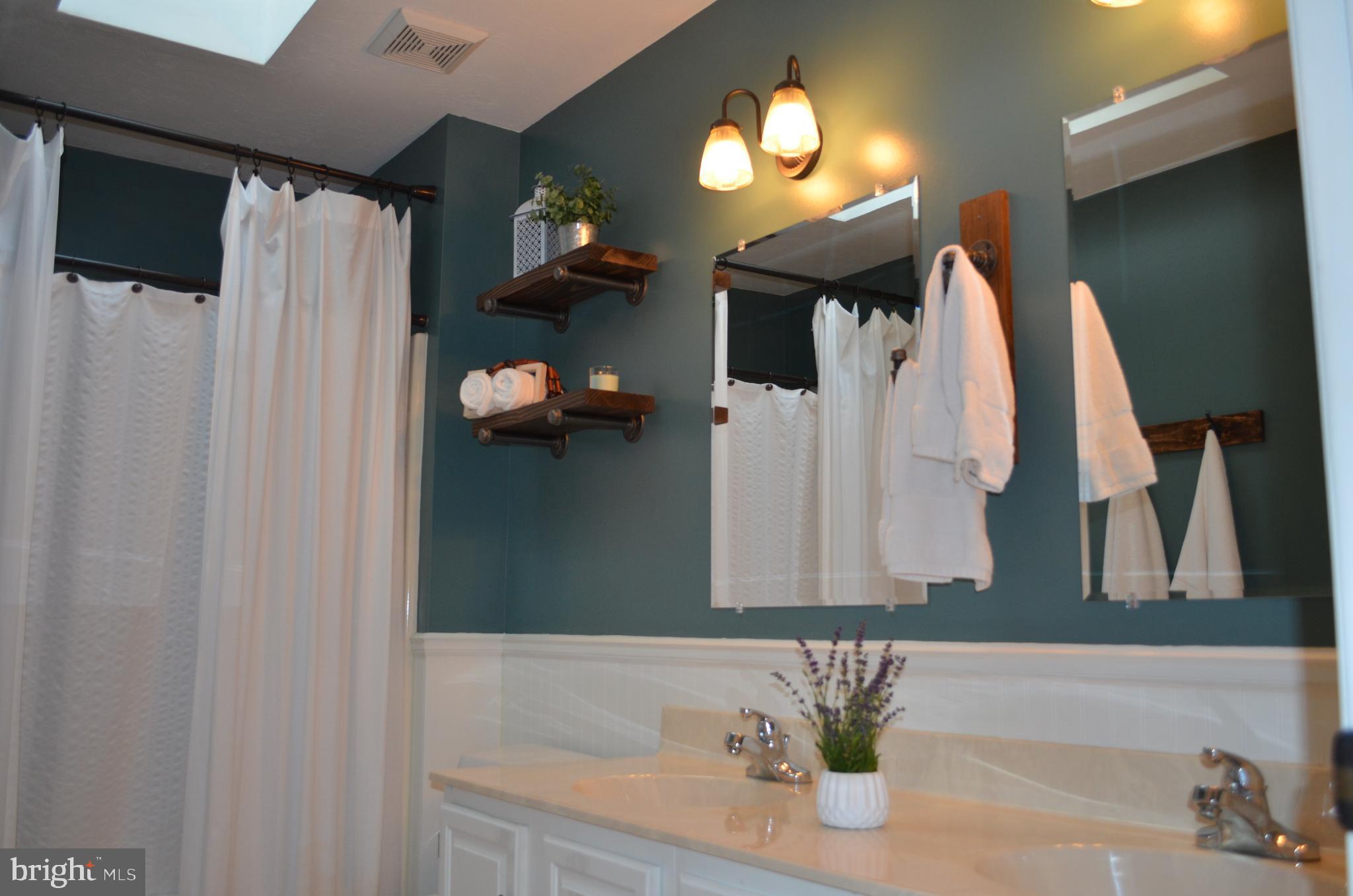 78 Allen Road Ephrata, PA 17522 - Photo 8 of 17 Main bath - double vanity & solar powered skylight