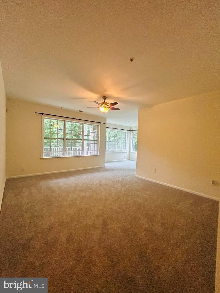 1028 Timberlake Drive Ewing, NJ 08618 - Photo 3 of 11 an empty room with windows