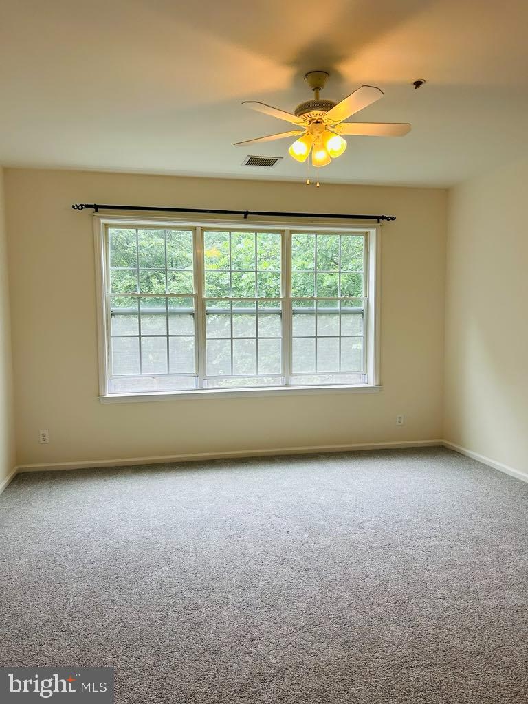 1028 Timberlake Drive Ewing, NJ 08618 - Photo 4 of 11 an empty room with a window