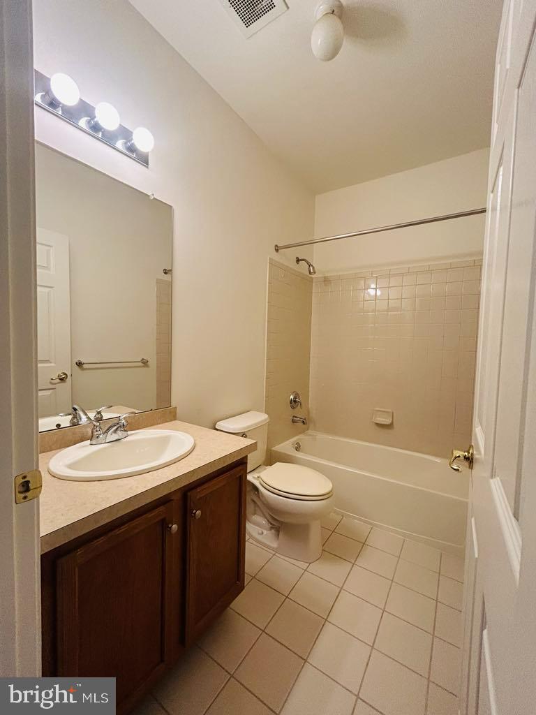 1028 Timberlake Drive Ewing, NJ 08618 - Photo 8 of 11 a bathroom with a sink a toilet and shower