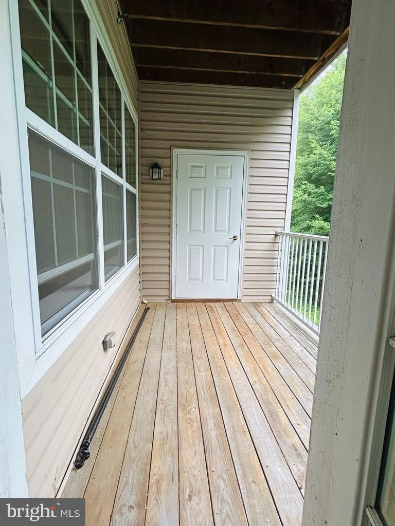 1028 Timberlake Drive Ewing, NJ 08618 - Photo 9 of 11 a view of a wooden deck