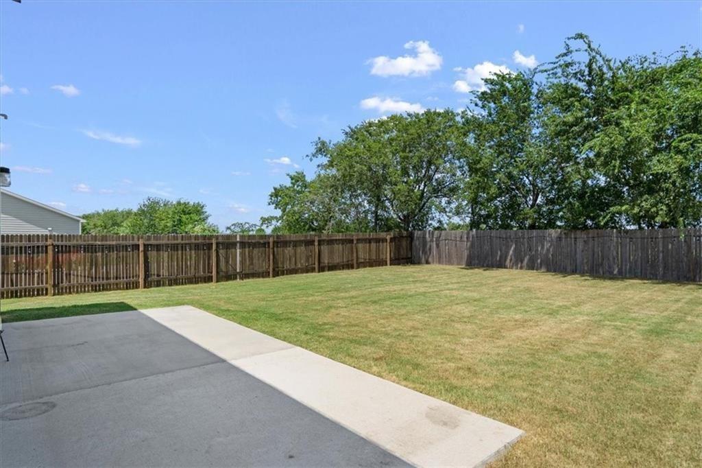 6500 Routenburn Street Austin, TX 78754 - Photo 35 of 38 Fenced backyard with a patio