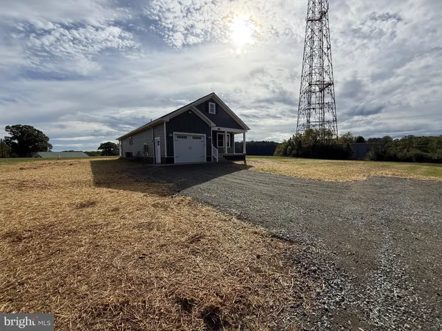 a kitchen with a sink cabinets and window